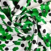 Tela de neopreno lunar flores verde.